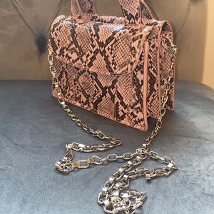 Mauve snake crossbody